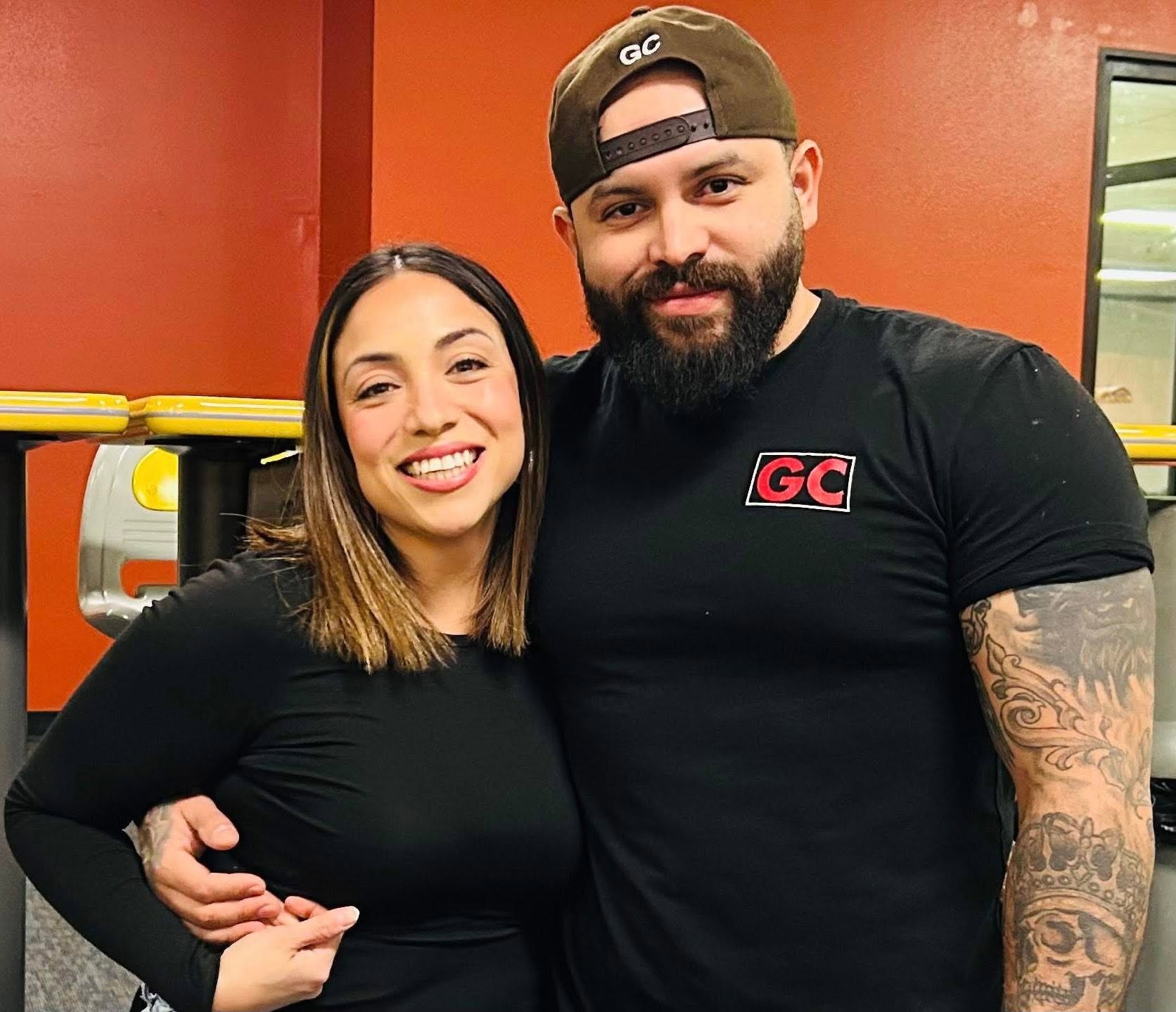 The two faces of GC Cleaning, smiling side by side in black — the red GC mark on his shirt and on his cap